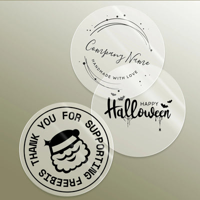 Clear 2-inch labels printed on MUNBYN label printer paper, showing neatly aligned transparent labels on a roll.