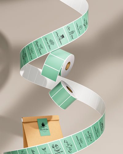 Green rectangular labels printed on MUNBYN label printer paper, measuring 2.25 by 1.25 inches.