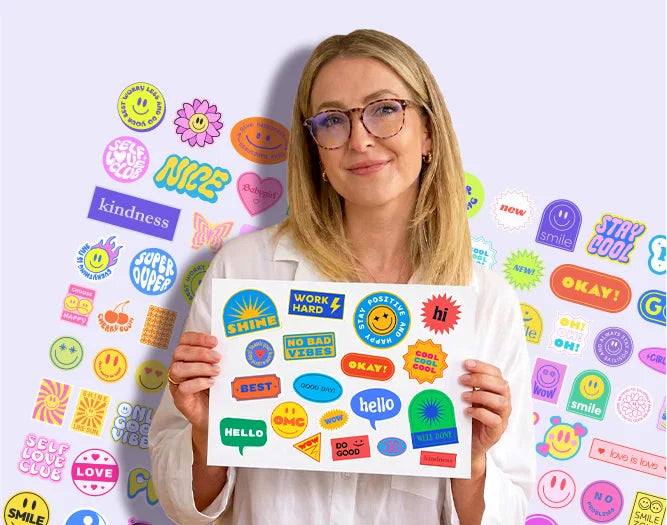 Woman holding a sheet of MUNBYN colorful custom stickers with various designs and text against a light purple background.